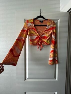 NGOrder Orange Flare Sleeve Tie Front Crochet Crop Top